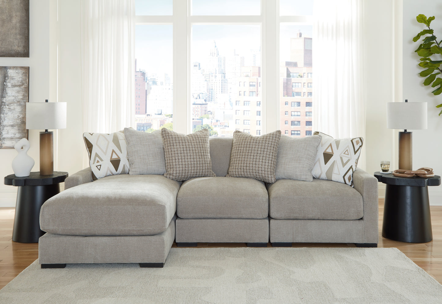 Auburndale Furniture Outlet - Ashley Furniture - Aslan Court Sectional - RAF 3-Piece Sofa Sectional with Chaise / Pebble - 20305S3