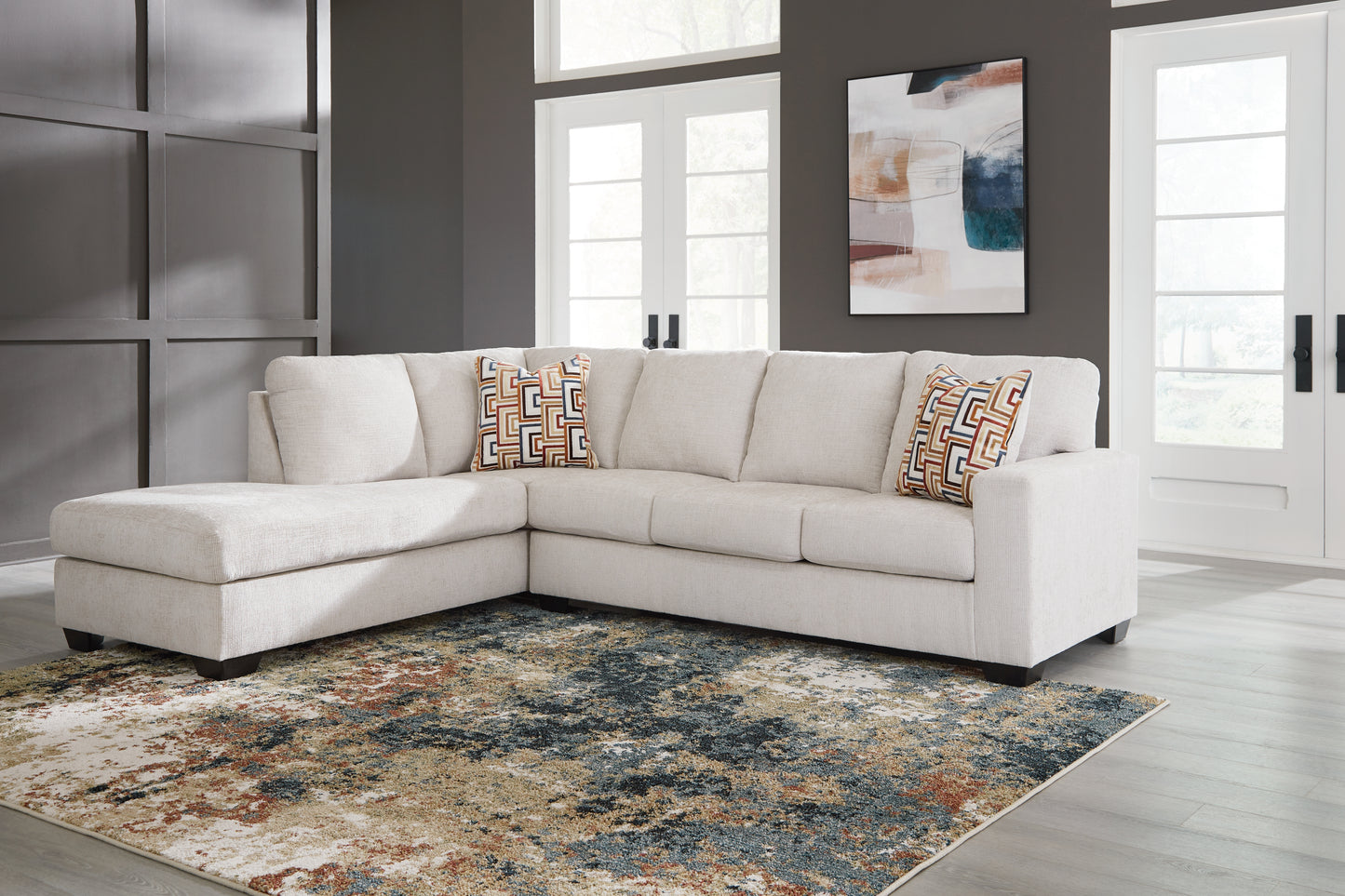 Auburndale Furniture Outlet - Ashley Furniture - Aviemore Sectional - RAF 2-Piece Sectional with Chaise / Stone - 24305S1