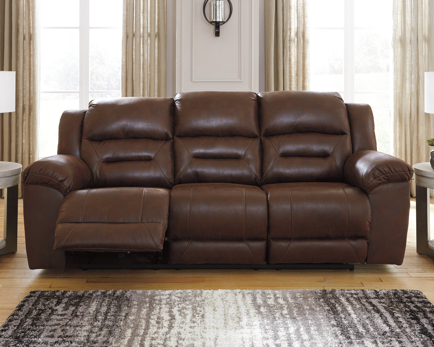 Auburndale Furniture Outlet - Ashley Furniture - Stoneland Living Room - Reclining Power Sofa / Chocolate - 3990487