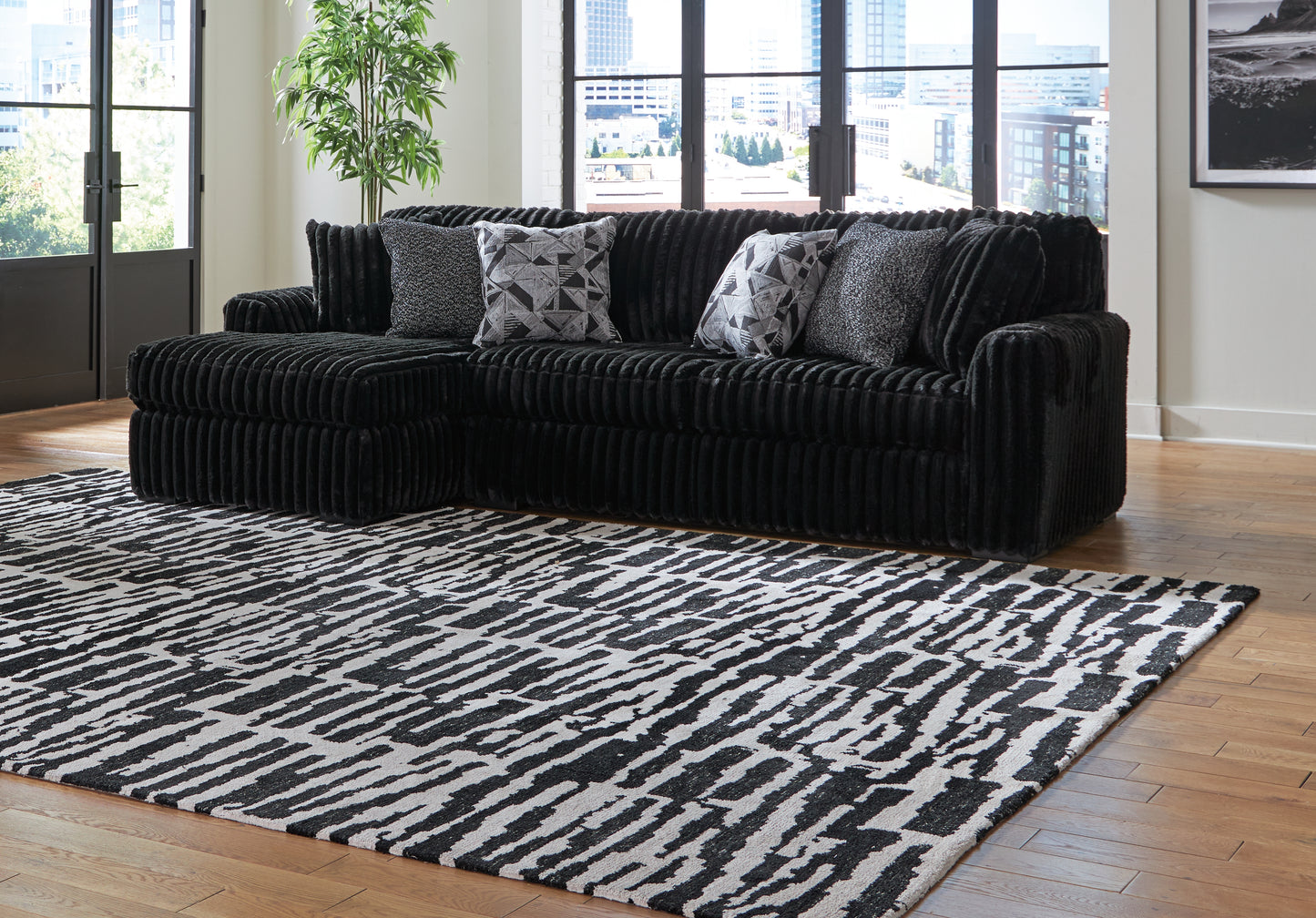 Auburndale Furniture Outlet - Ashley Furniture - Midnight-Madness Sectional - LAF 3-Piece Sectional with Chaise / Onyx - 98103S9