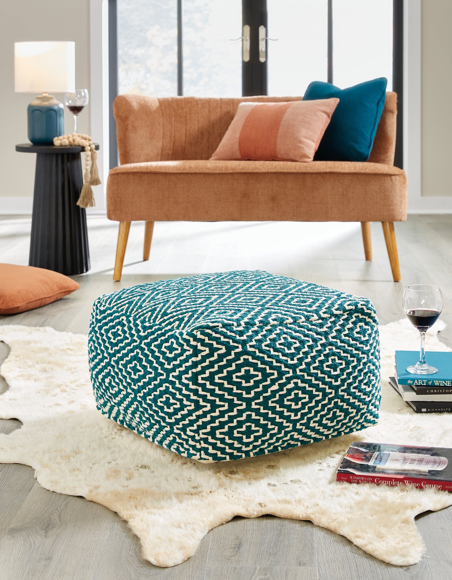 Auburndale Furniture Outlet - Ashley Furniture - Brynnsen Pouf - Pouf / Teal/Ivory - A1001055