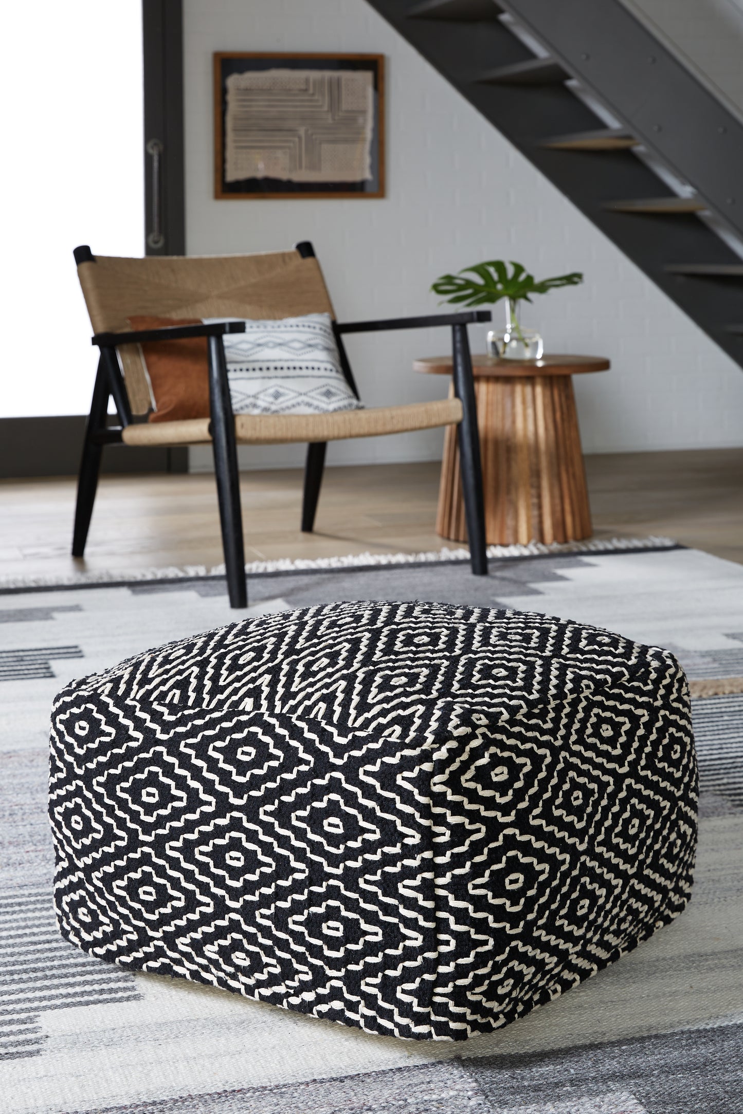 Auburndale Furniture Outlet - Ashley Furniture - Jasett Pouf - Pouf / Black/Ivory - A1001058