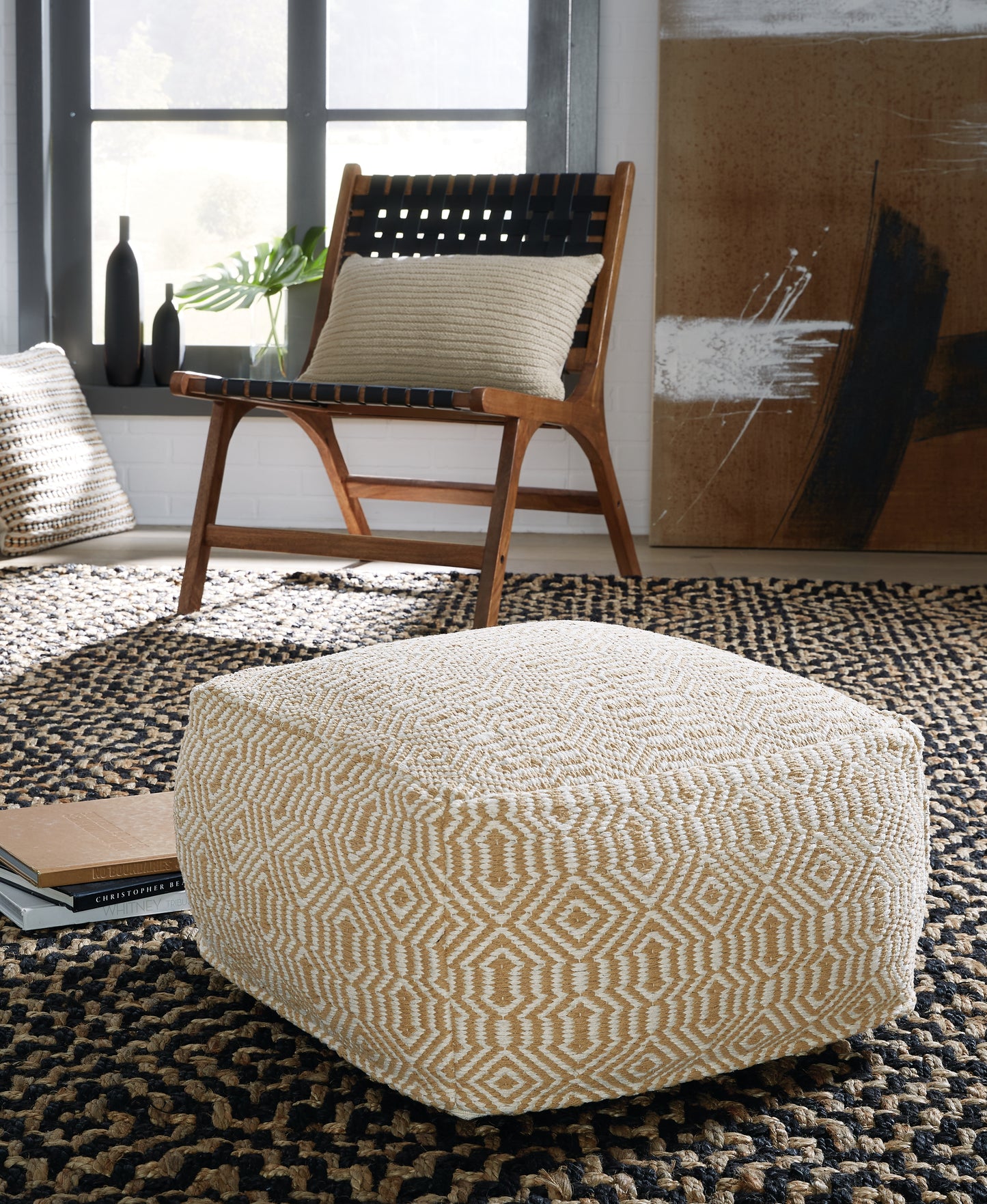 Auburndale Furniture Outlet - Ashley Furniture - Adamont Pouf - Pouf / Tan/Ivory - A1001059