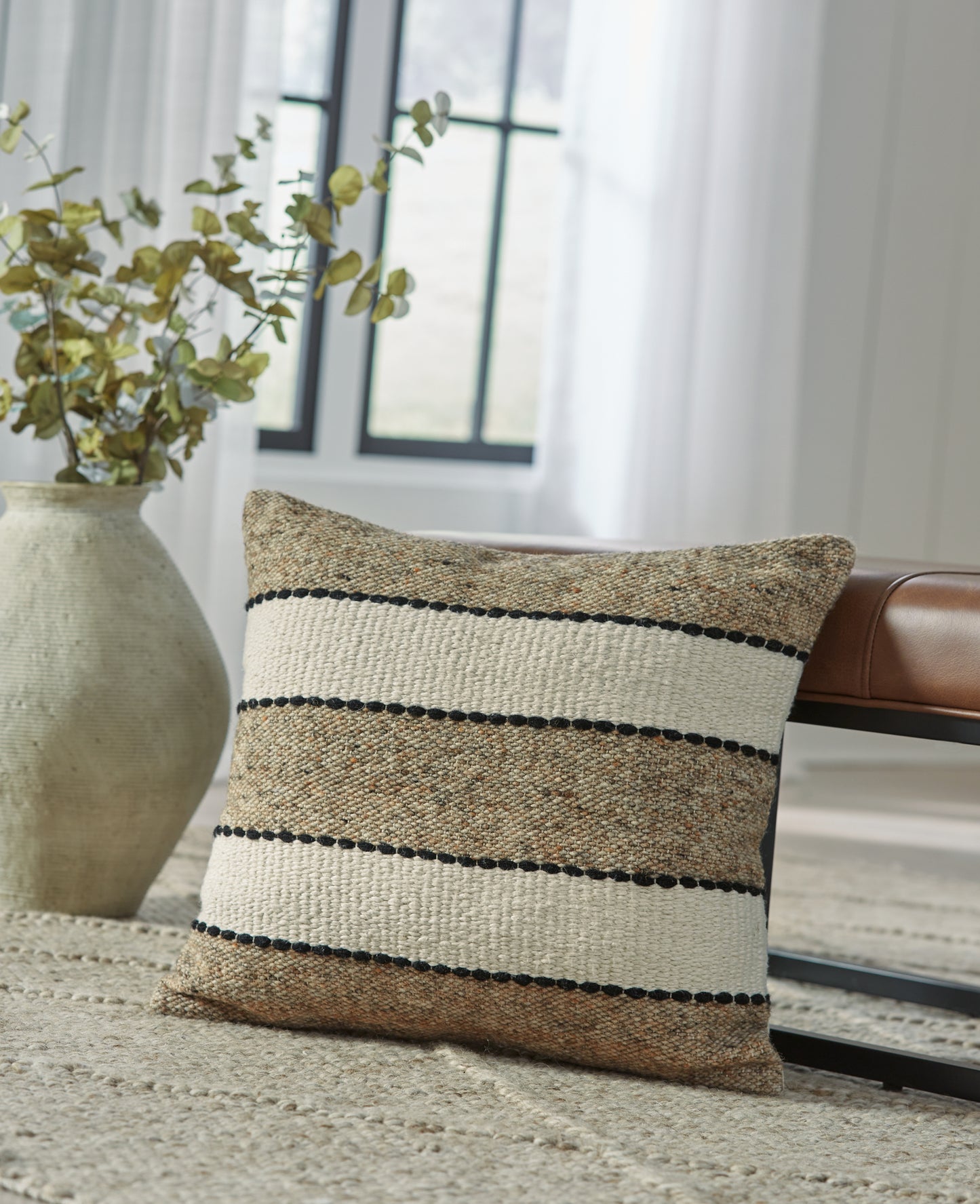 Auburndale Furniture Outlet - Ashley Furniture - Rueford Pillows - Pillow (4/CS) / Brown/Black/Natural - A1001063