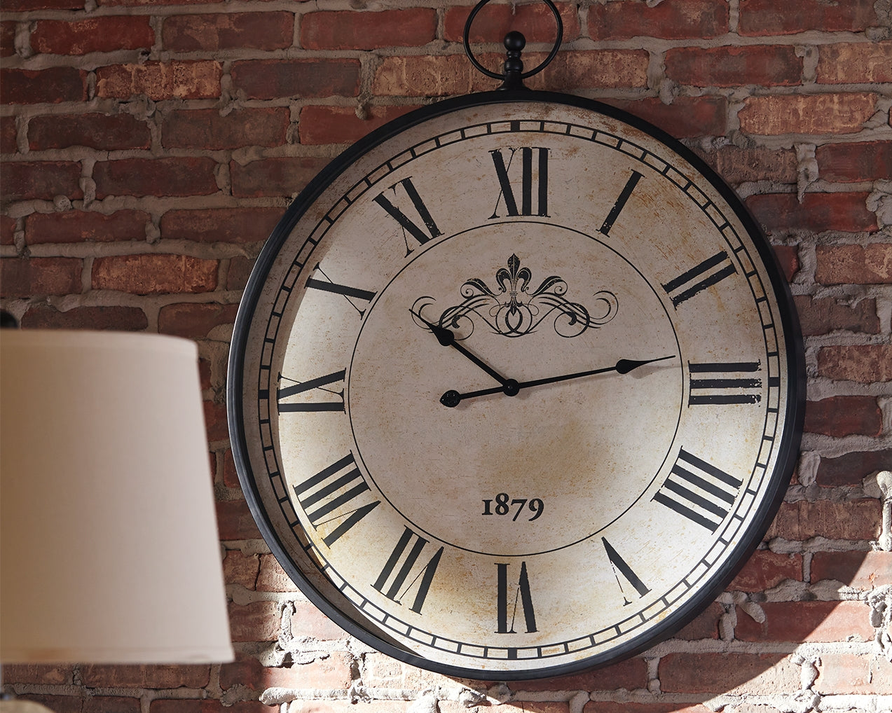 Auburndale Furniture Outlet - Ashley Furniture - Augustina Wall Decor - Wall Clock / Antique Black - A8010110