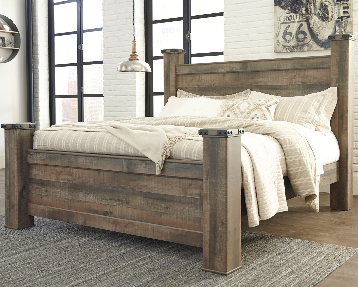 Auburndale Furniture Outlet - Ashley Furniture - Trinell Bedroom - King Poster Bed / Brown - B446B45