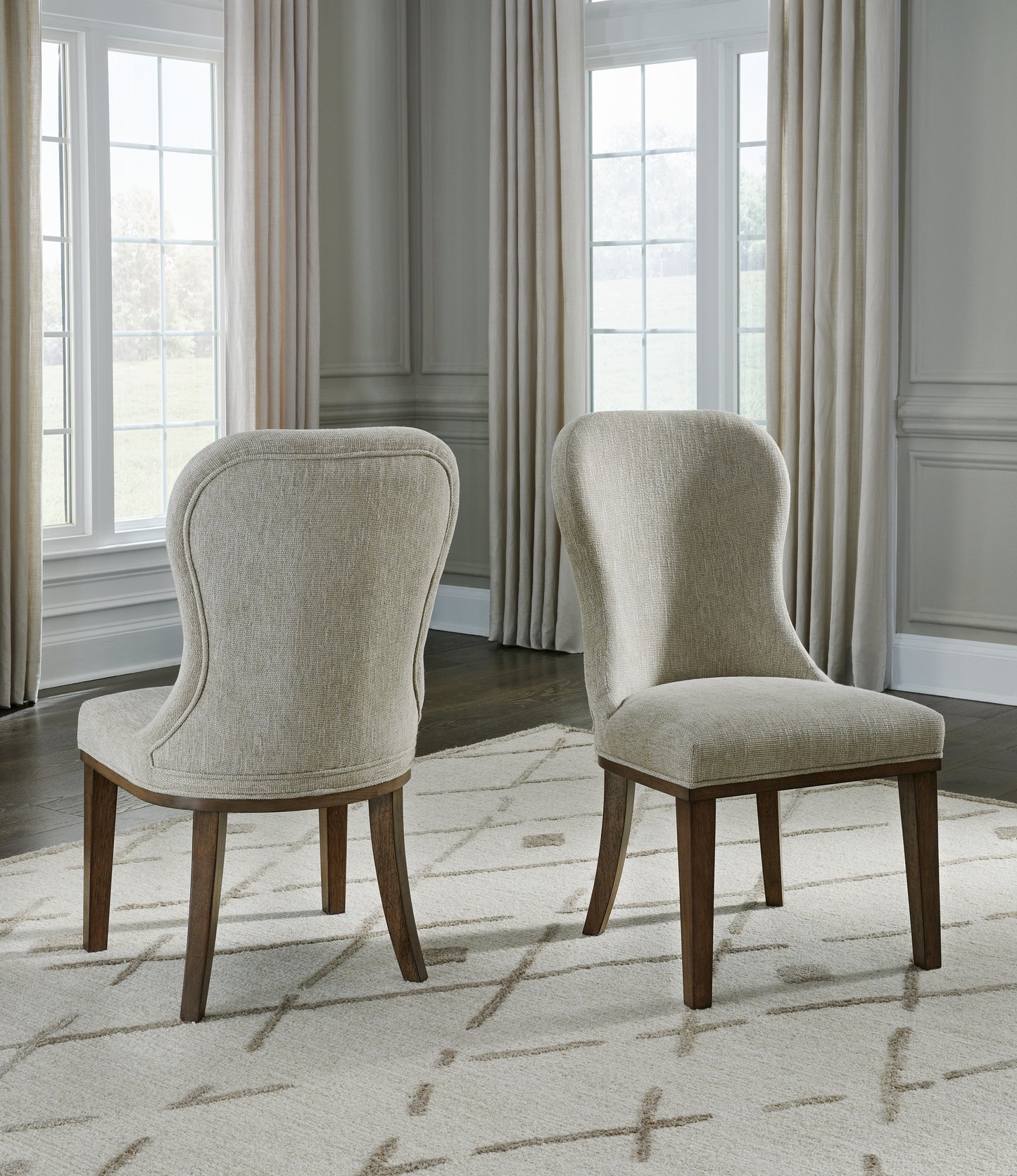 Auburndale Furniture Outlet - Ashley Furniture - Sturlayne Dining Room - Dining Chair (Set of 2) / Brown - D787-02X2