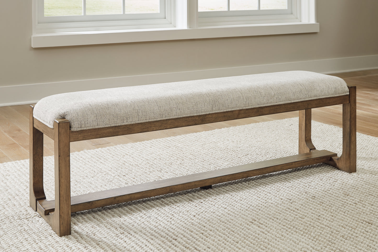 Auburndale Furniture Outlet - Ashley Furniture - Cabalynn Dining Room - Large UPH Dining Room Bench / Oatmeal/Light Brown - D974-00