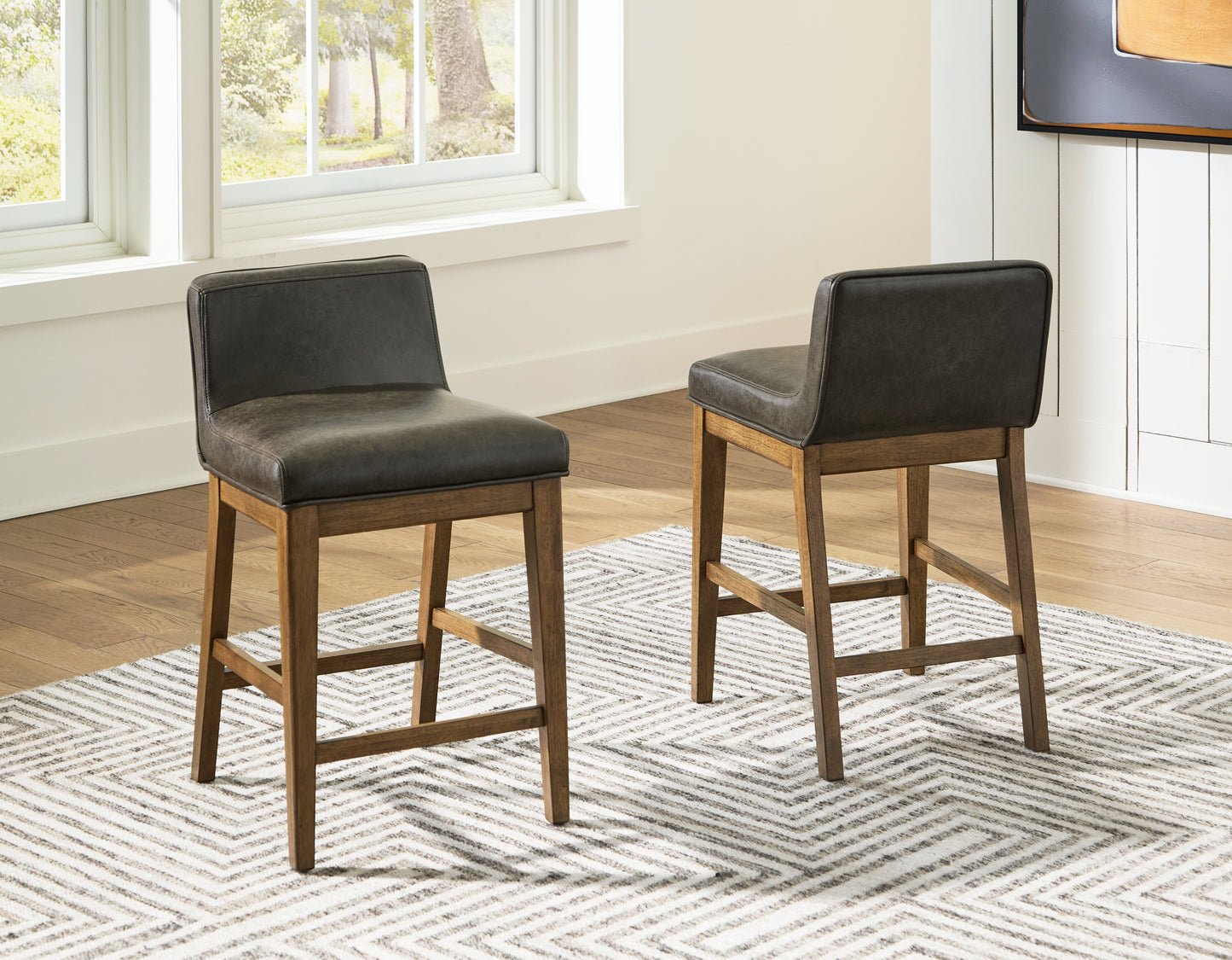 Auburndale Furniture Outlet - Ashley Furniture - Cabalynn Dining Room - Counter Height Barstool (Set of 2) / Light Brown - D974-124X2