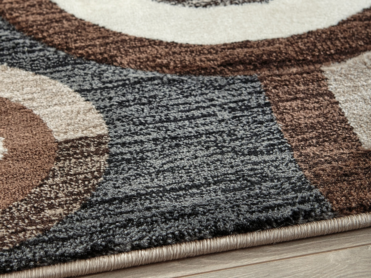 Auburndale Furniture Outlet - Ashley Furniture - Guintte Rug - 5' x 6'7" Rug / Multi - R403972