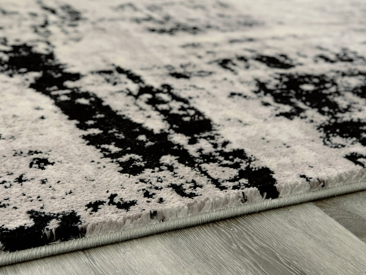 Auburndale Furniture Outlet - Ashley Furniture - Zekeman Rug - 5'3" x 7'7" Rug / Black/Cream/Gray - R404922