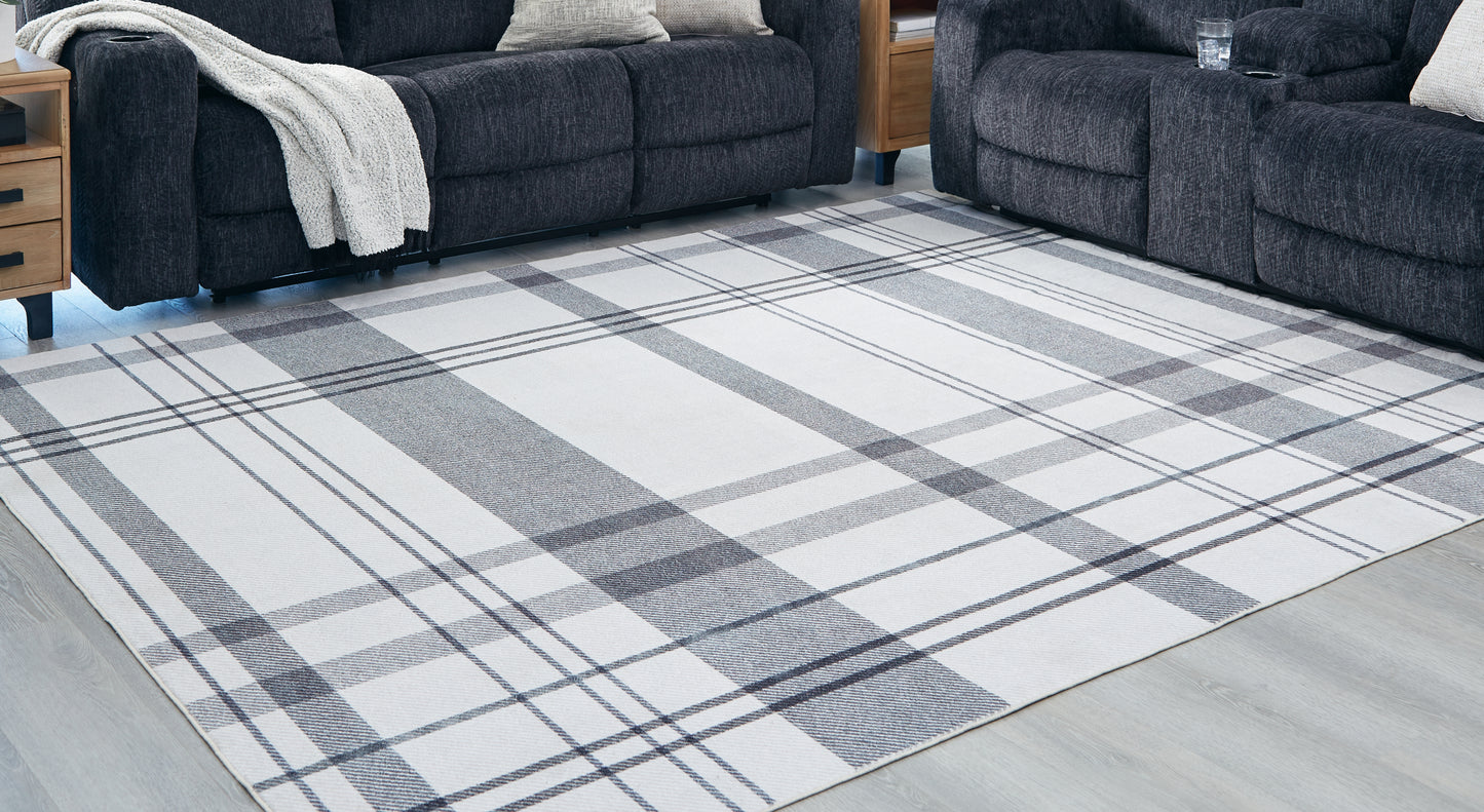 Auburndale Furniture Outlet - Ashley Furniture - Kaidlow Rug - 7'7" x 9'8" Washable Rug / Gray/Cream - R405911