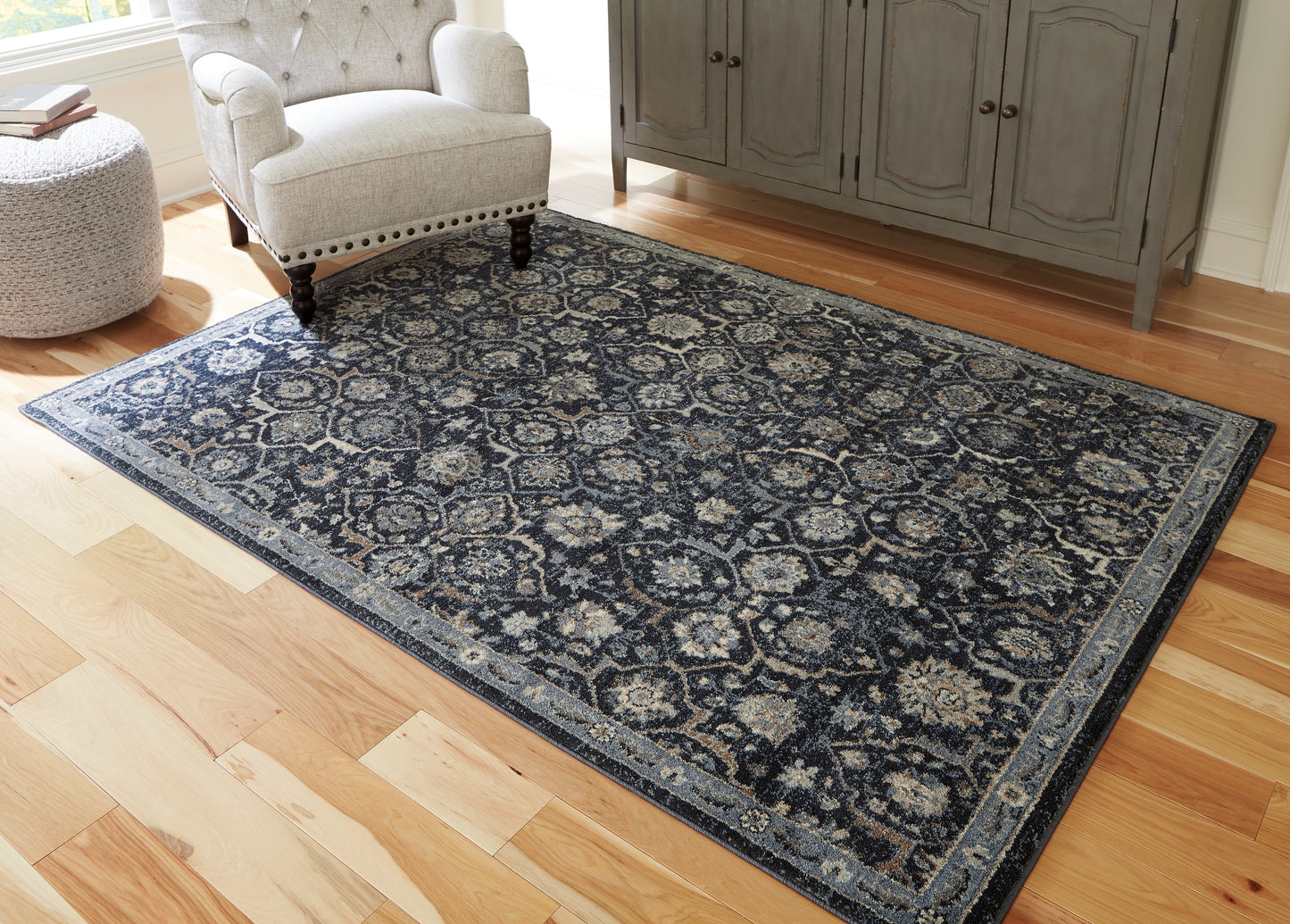 Auburndale Furniture Outlet - Ashley Furniture - Hilcott Rug - 5'3" x 7'3" Rug / Blue/Cream/Brown - R406112
