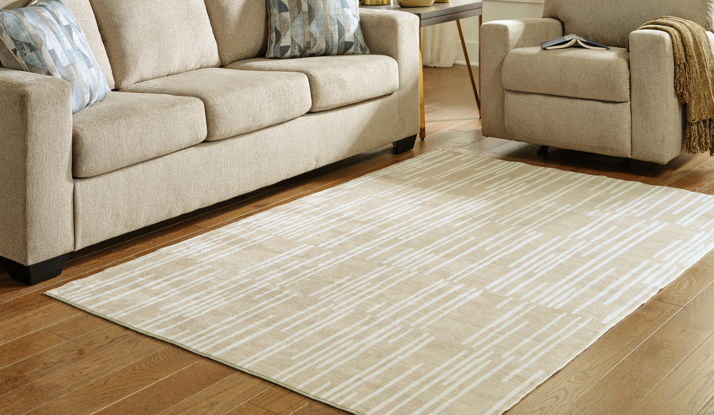 Auburndale Furniture Outlet - Ashley Furniture - Ardenville Rug - 5' x 7'1" Washable Rug / Tan/Cream - R406212