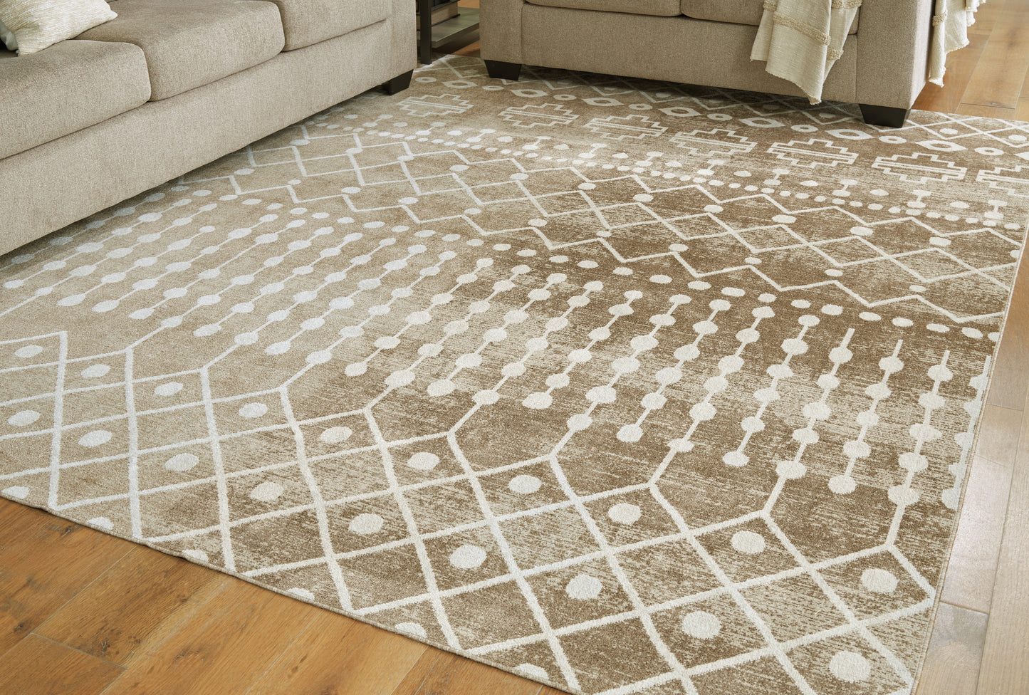 Auburndale Furniture Outlet - Ashley Furniture - Bunchly Rug - 4'11" x 7'2" Washable Rug / Tan/Brown/Cream - R406222
