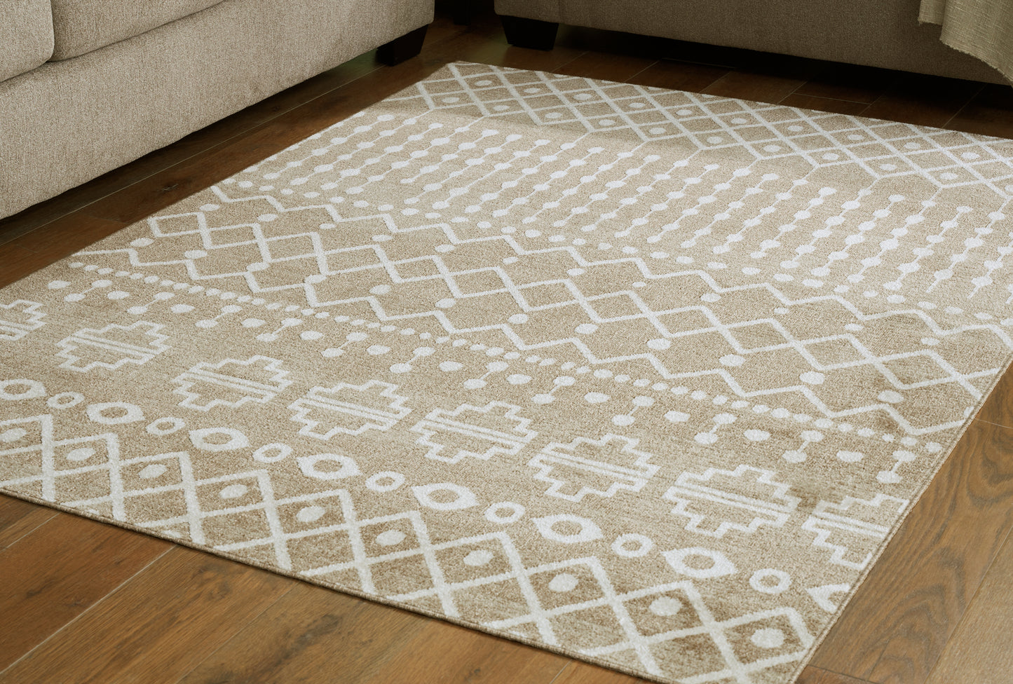 Auburndale Furniture Outlet - Ashley Furniture - Bunchly Rug - 4'11" x 7'2" Washable Rug / Tan/Brown/Cream - R406222