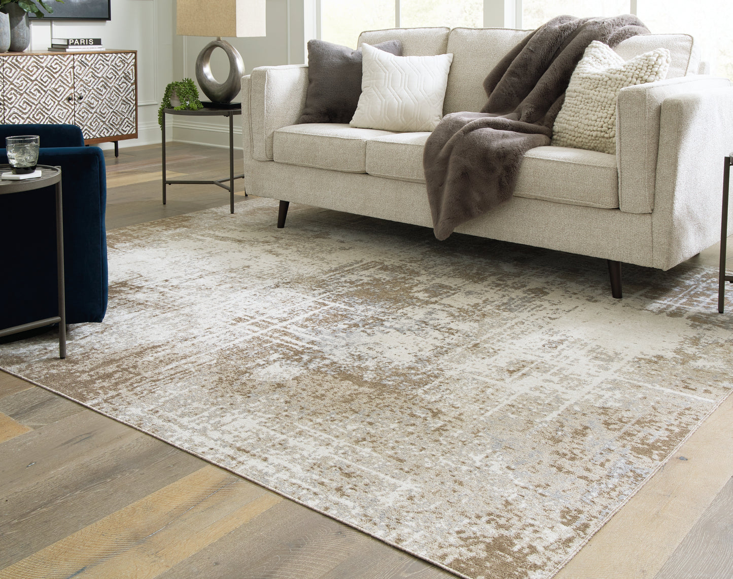 Auburndale Furniture Outlet - Ashley Furniture - Grifflain Rug - 7'10" x 10'3" Washable Rug / Tan/Brown/Gray - R406231