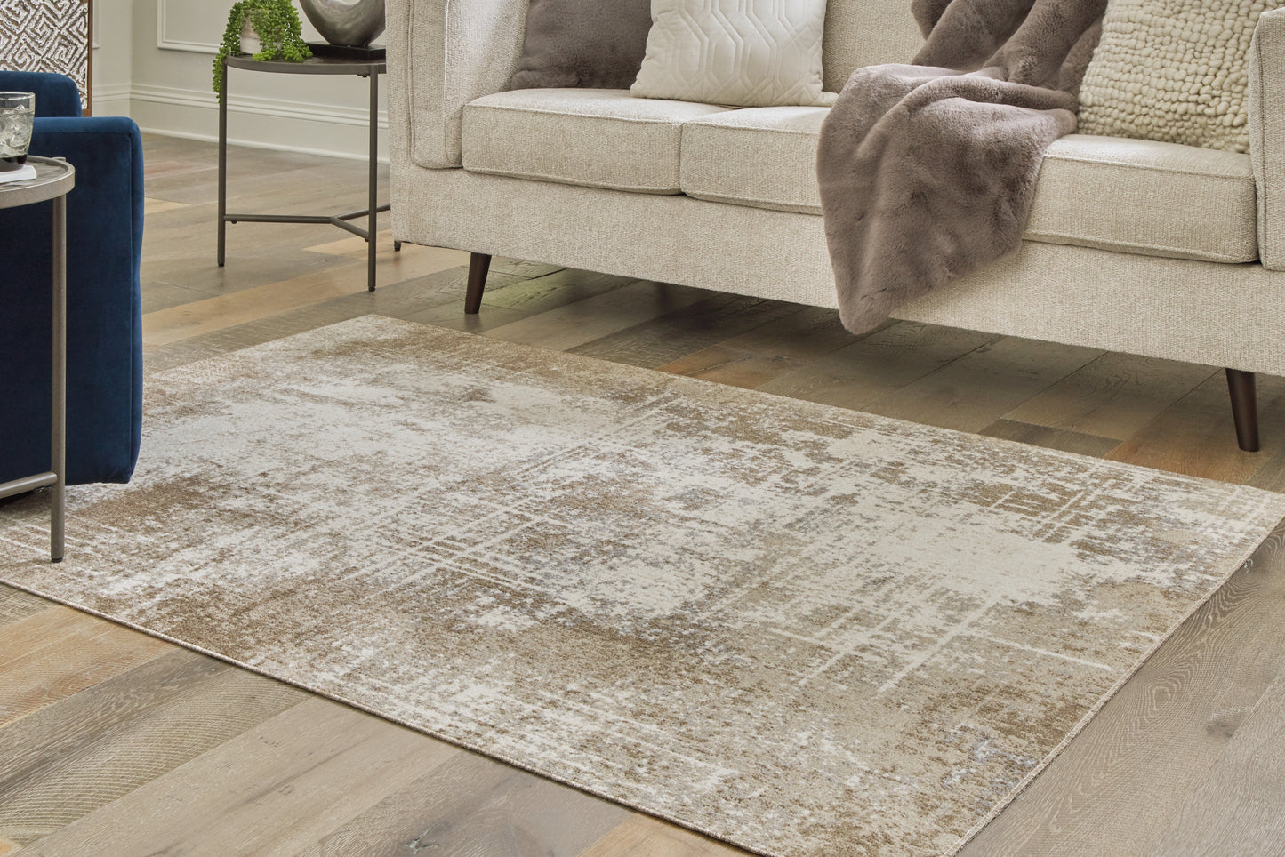 Auburndale Furniture Outlet - Ashley Furniture - Grifflain Rug - 5'1" x 7' Washable Rug / Tan/Brown/Gray - R406232