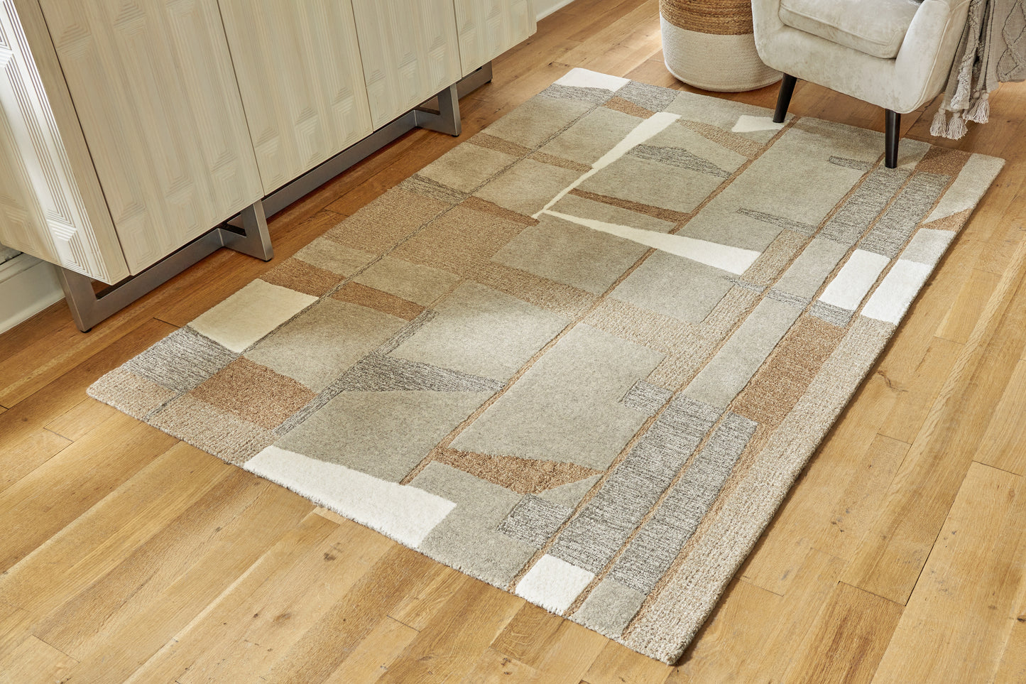 Auburndale Furniture Outlet - Ashley Furniture - Abbotton Rug - 5' x 7' Rug / Taupe/Gray/Caramel - R406332