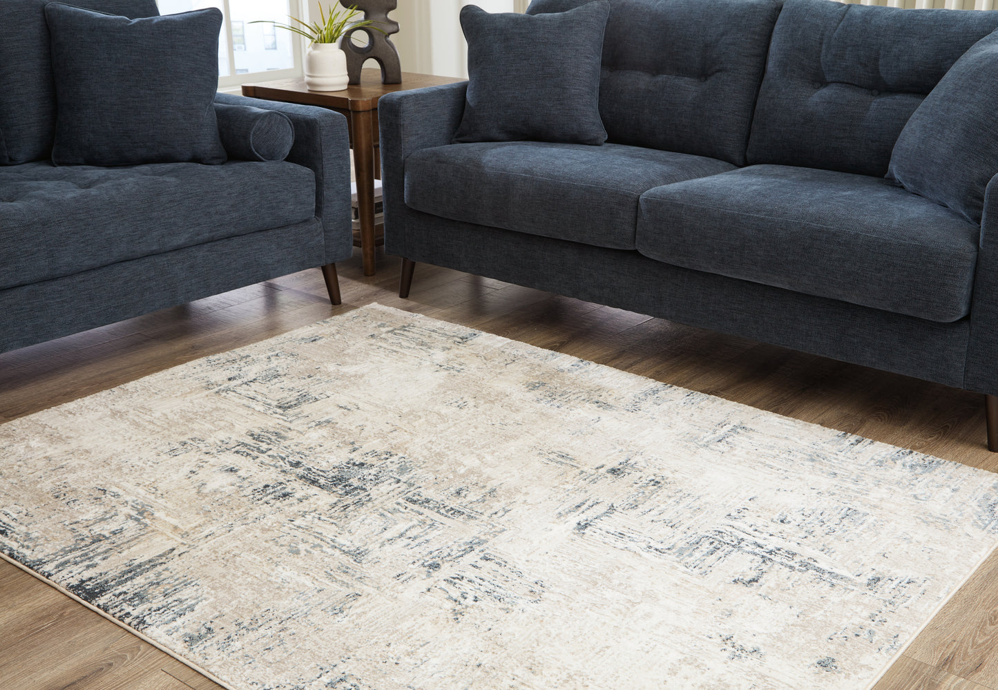 Auburndale Furniture Outlet - Ashley Furniture - Gentor Rug - 5' x 7' Rug / Blue/Ivory - R406522