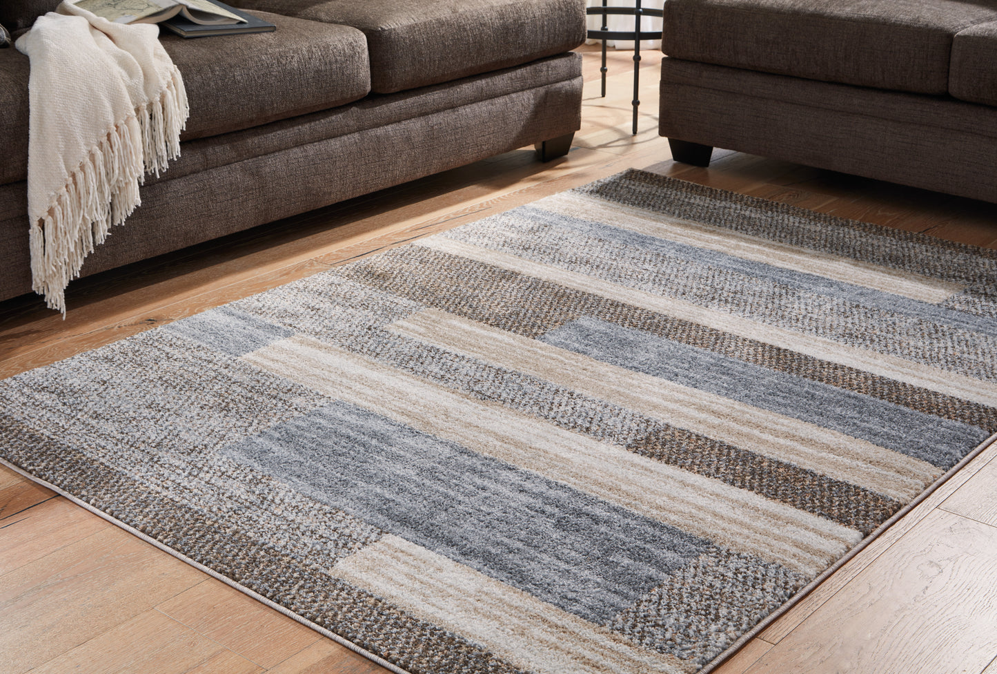 Auburndale Furniture Outlet - Ashley Furniture - Sethburn Rug - 5' x 7' Rug / Cream/Brown/Gray - R406592