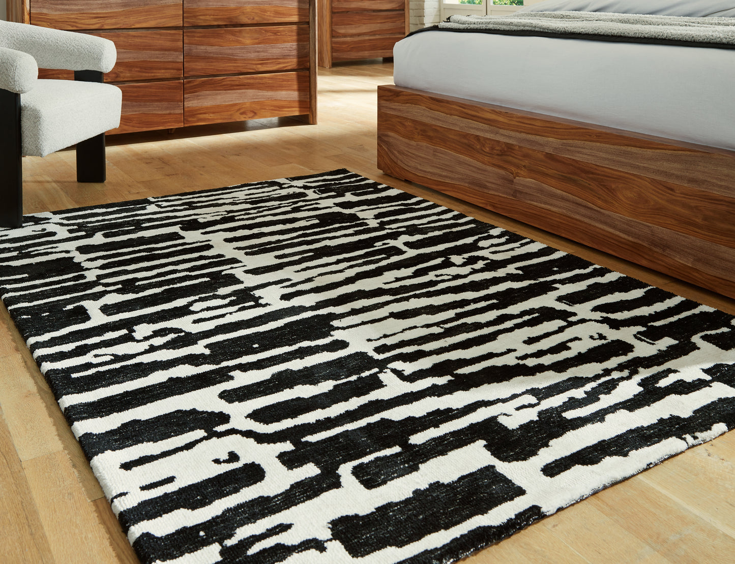 Auburndale Furniture Outlet - Ashley Furniture - Bramshaw Rug - 5' x 7' Rug / Black/Ivory - R406762