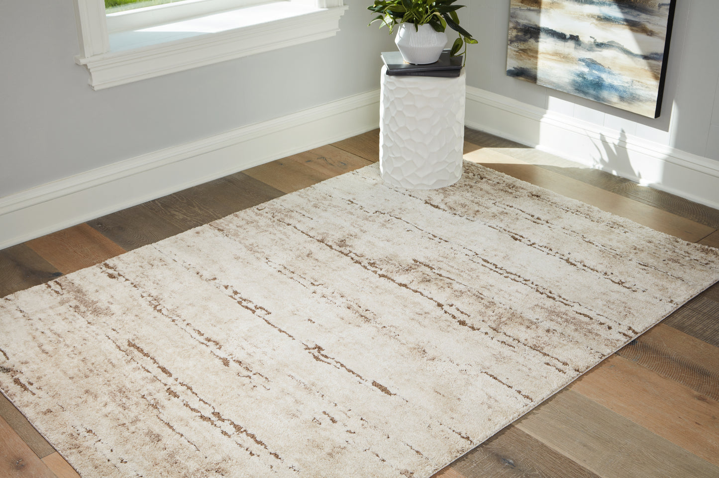 Auburndale Furniture Outlet - Ashley Furniture - Kasney Rug - 5' x 7' Rug / Cream/Brown - R406852