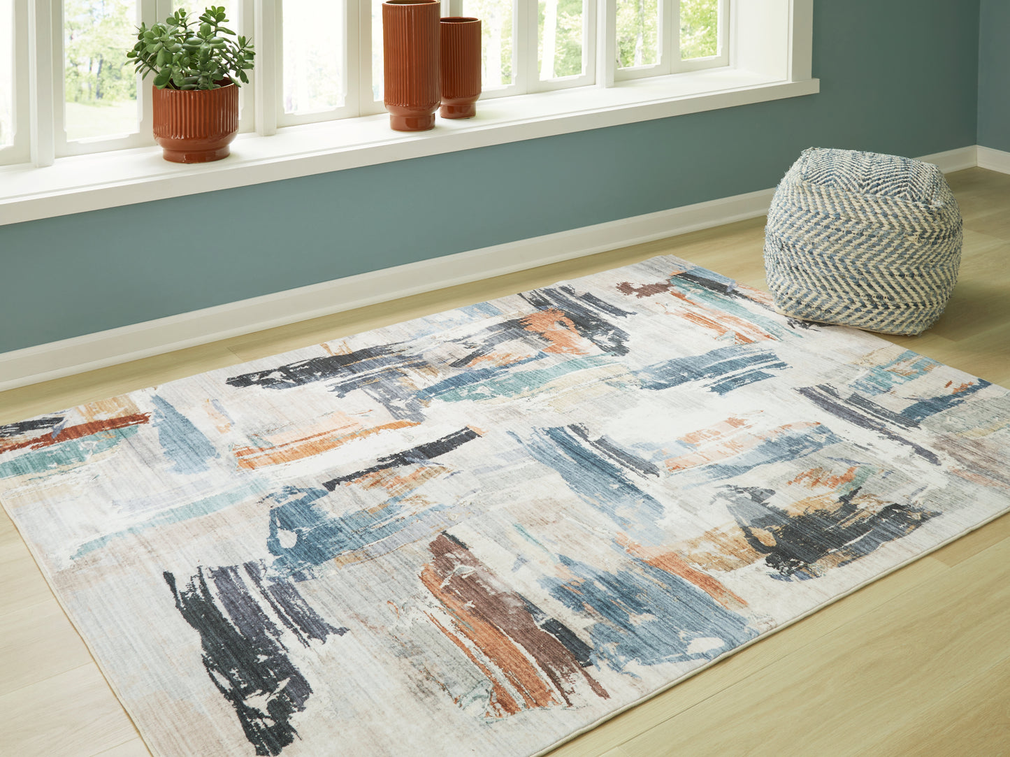 Auburndale Furniture Outlet - Ashley Furniture - Hessland Rug - 8' x 10' Washable Rug / Multi - R407051
