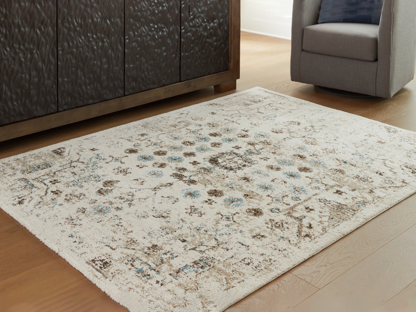 Auburndale Furniture Outlet - Ashley Furniture - Jossler Rug - 8' x 10' Rug / Ivory/Brown/Teal - R407071