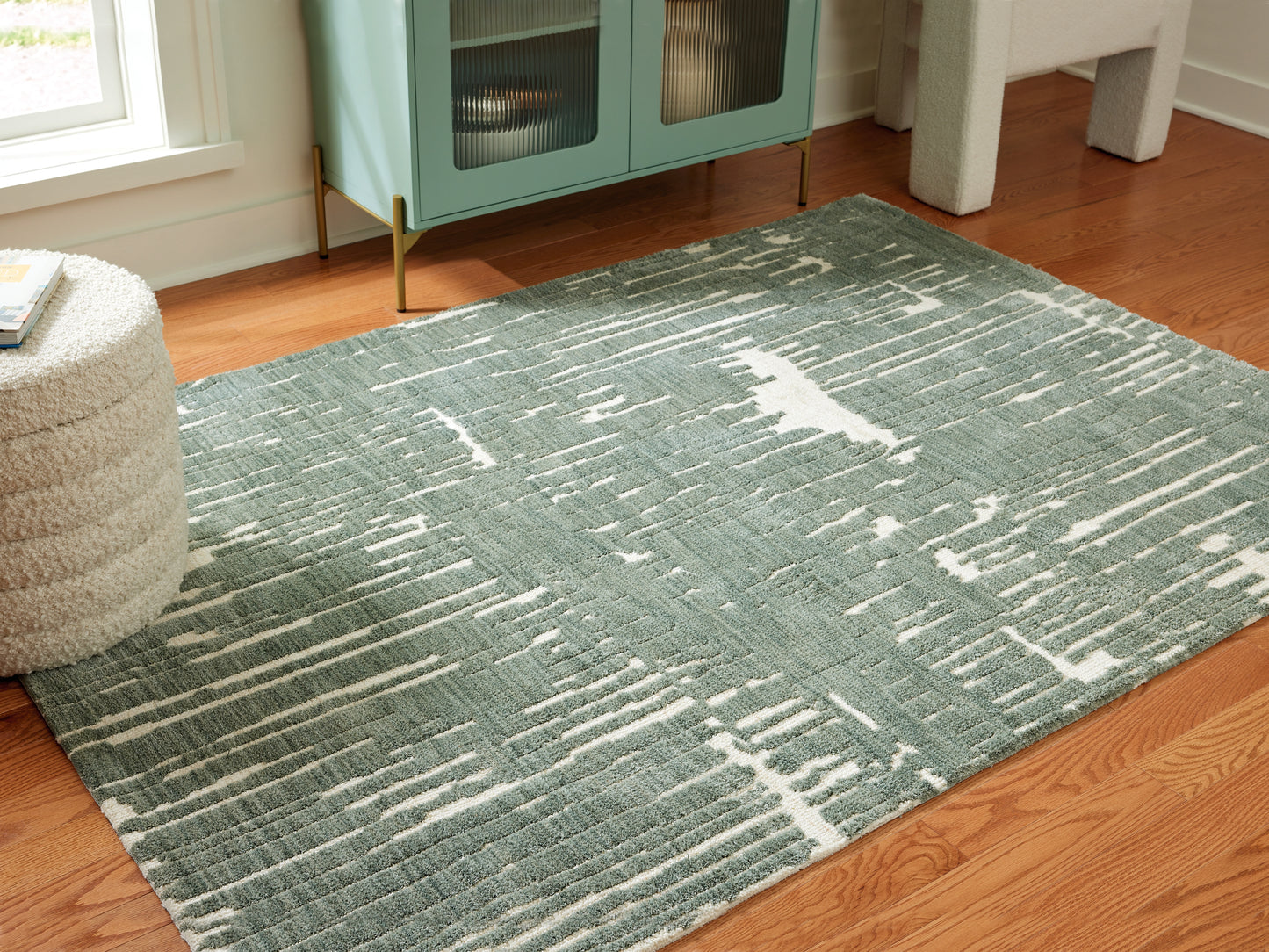 Auburndale Furniture Outlet - Ashley Furniture - Cayworth Rug - 5' x 7' Rug / Teal/White - R407092