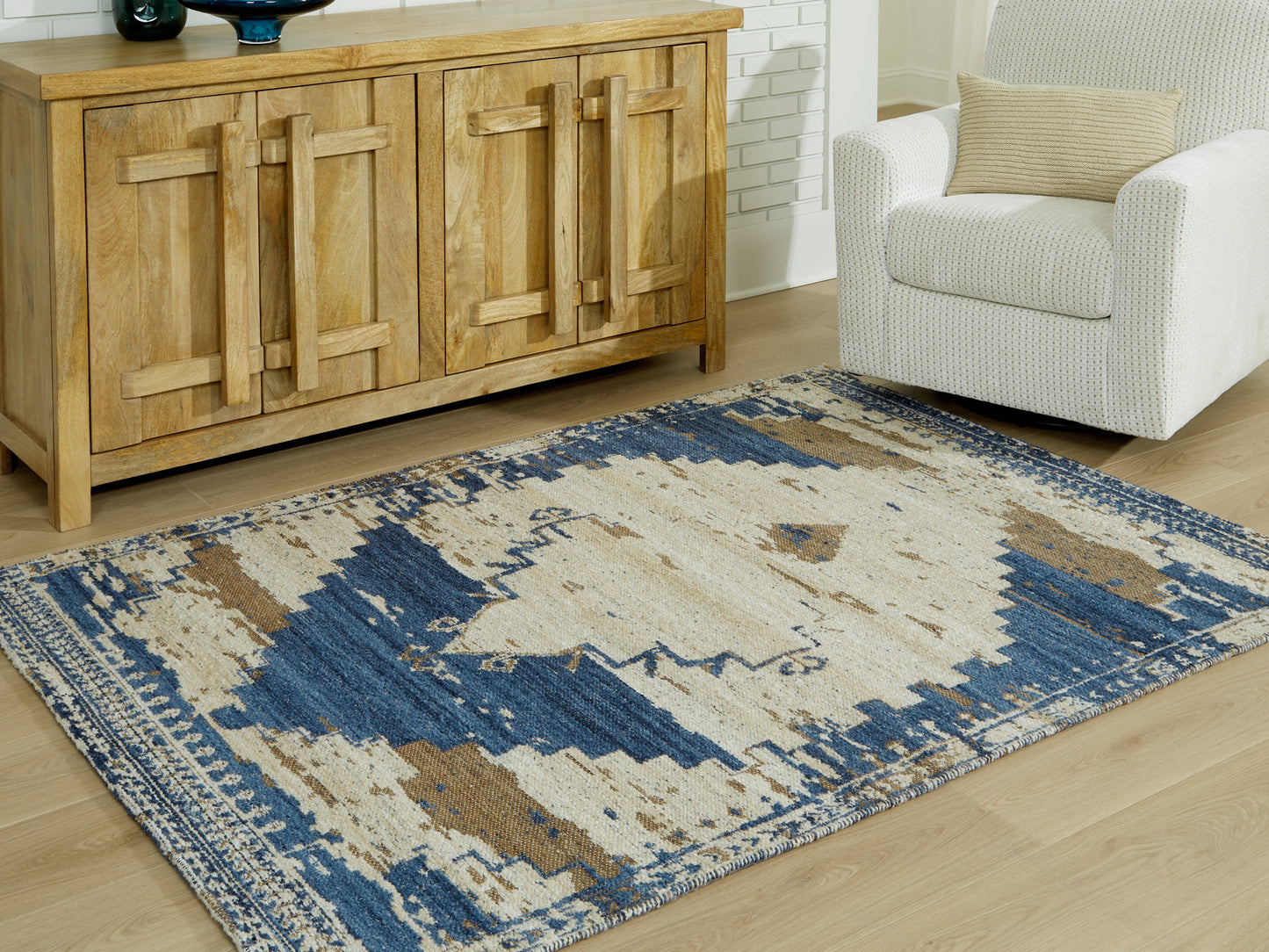 Auburndale Furniture Outlet - Ashley Furniture - Varnler Rug - 5' x 7' Rug / Blue/Brown/Tan - R407132