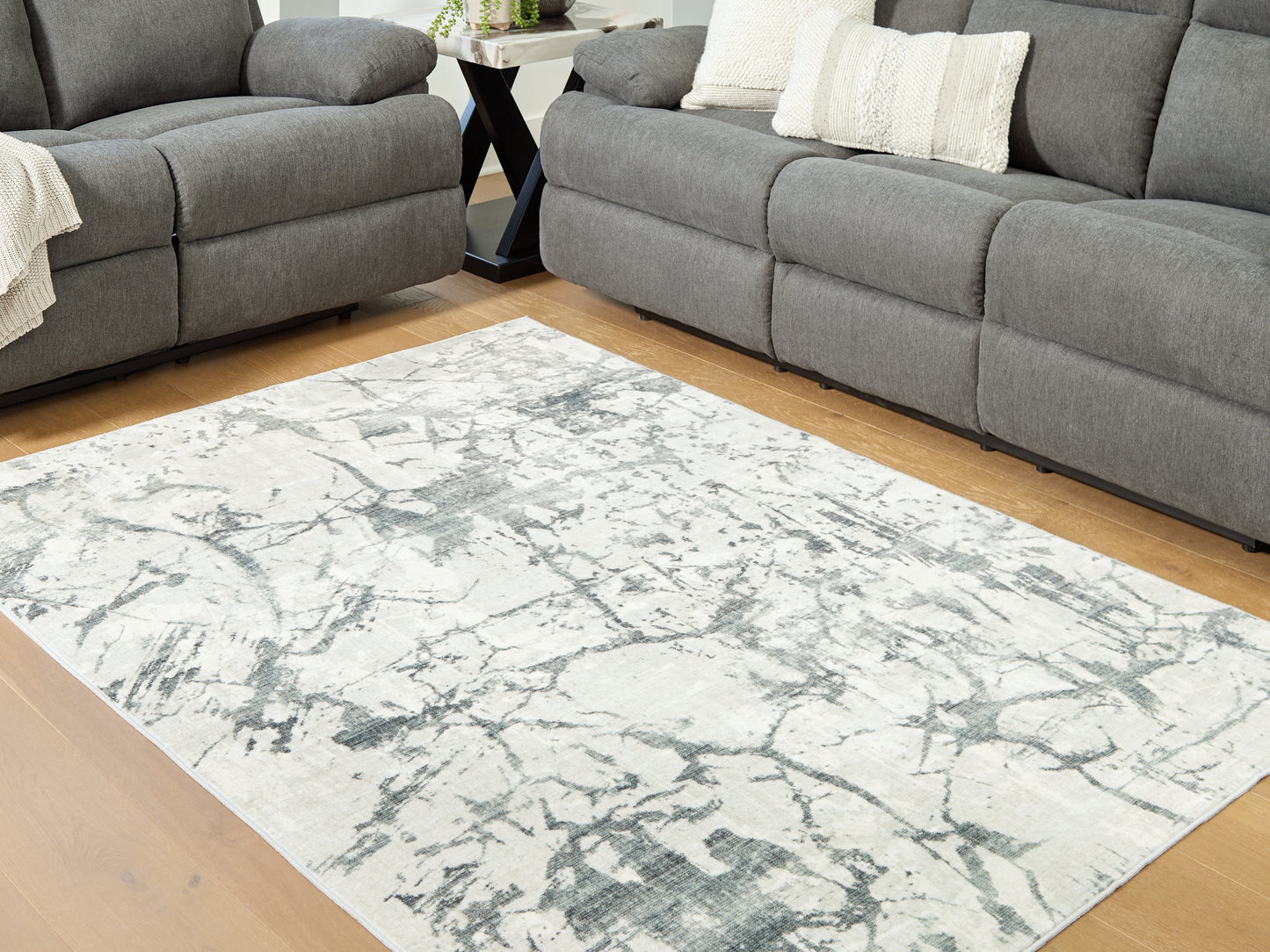 Auburndale Furniture Outlet - Ashley Furniture - Tobinbury Rug - Washable 5' x 7' Area Rug / Gray - R407422