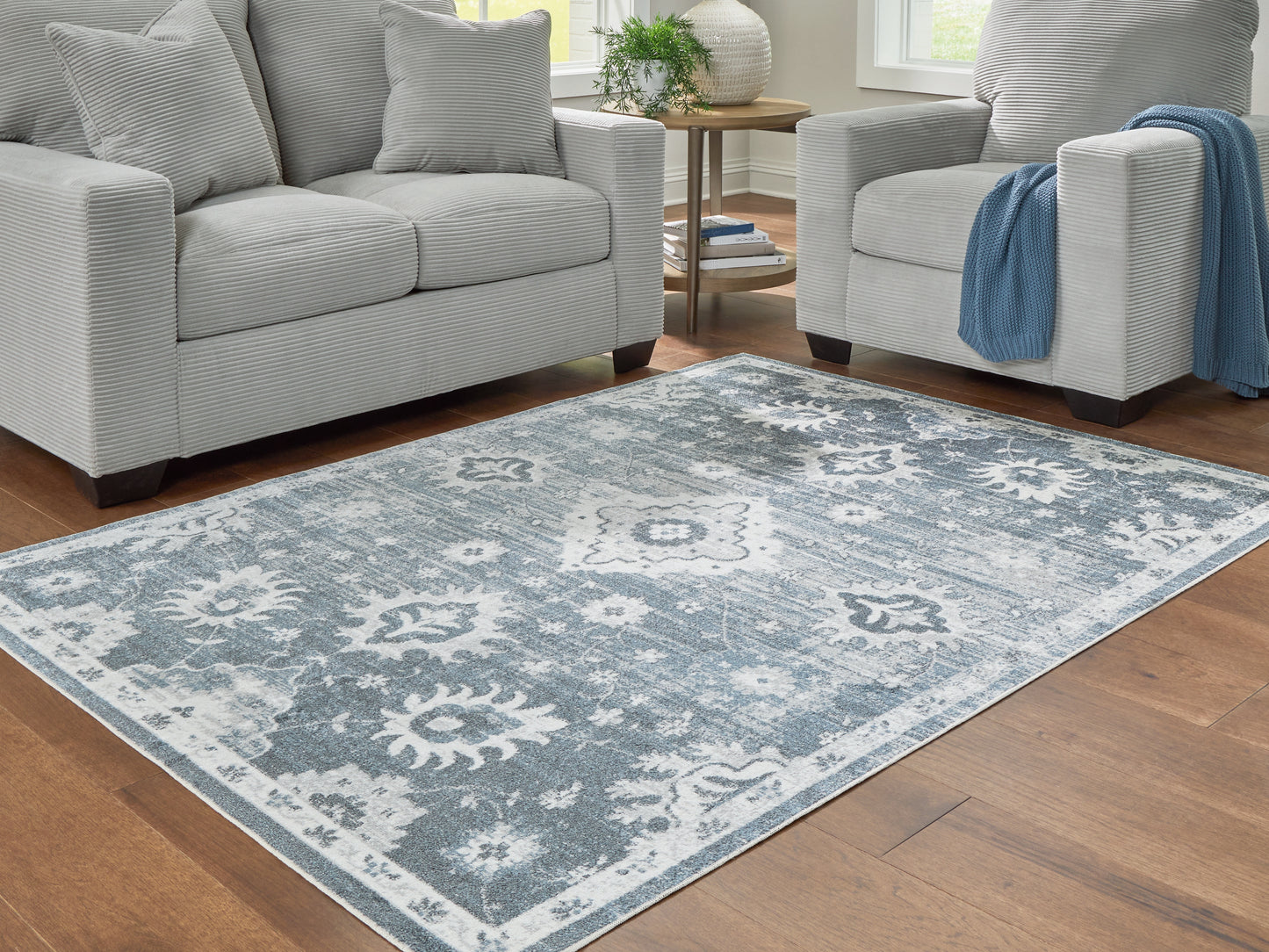 Auburndale Furniture Outlet - Ashley Furniture - Avanworths Rug - Washable 7'10" x 10' Area Rug / Blue/Gray/Ivory - R407791