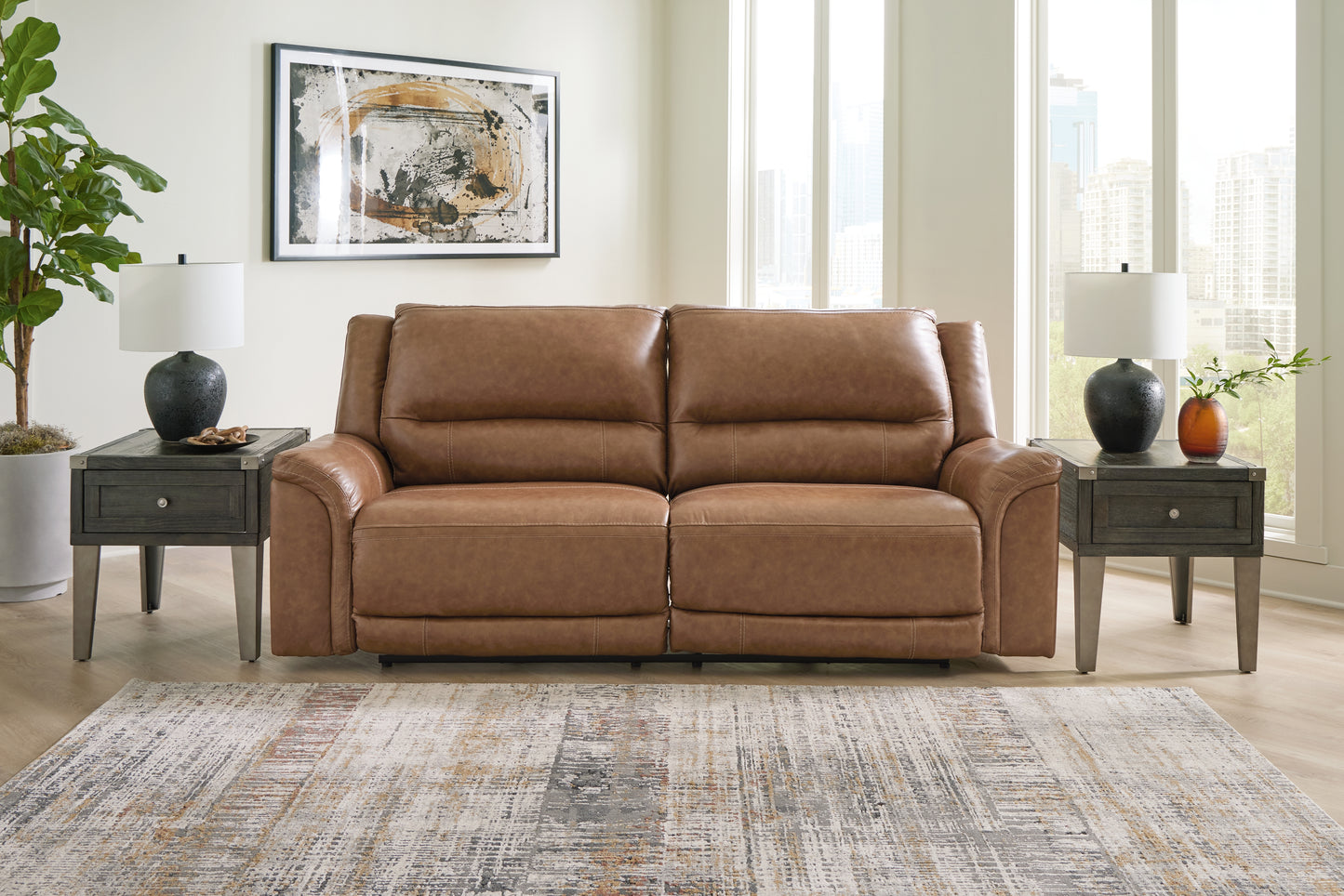 Auburndale Furniture Outlet - Ashley Furniture - Trasimeno Living Room - PWR Recliner/ADJ Headrest / Caramel - U8281513