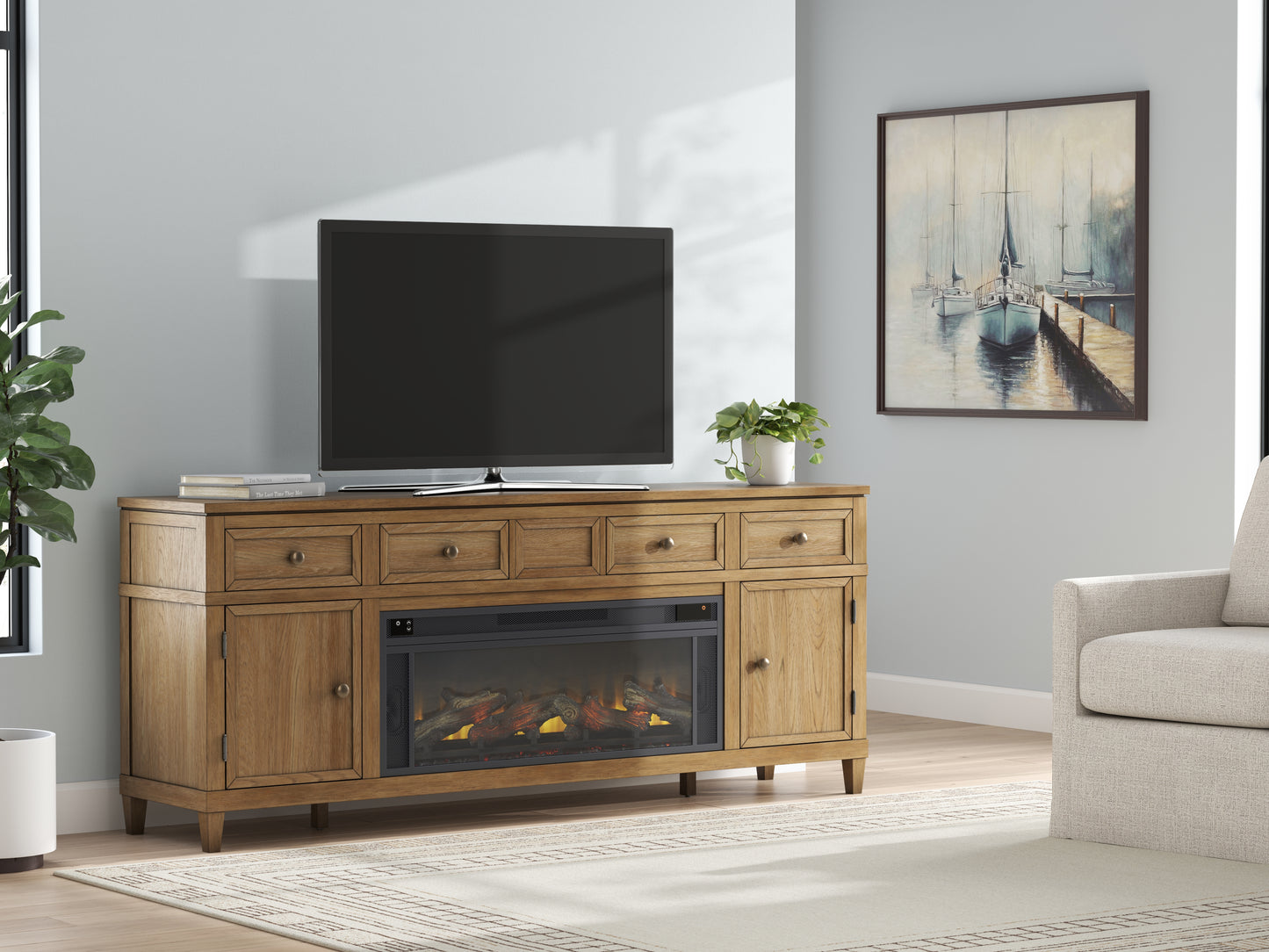 Auburndale Furniture Outlet - Ashley Furniture - Sharlance 81" TV Stand with Electric Fireplace - 81" TV Stand with Electric Fireplace / Light Brown - W655W1