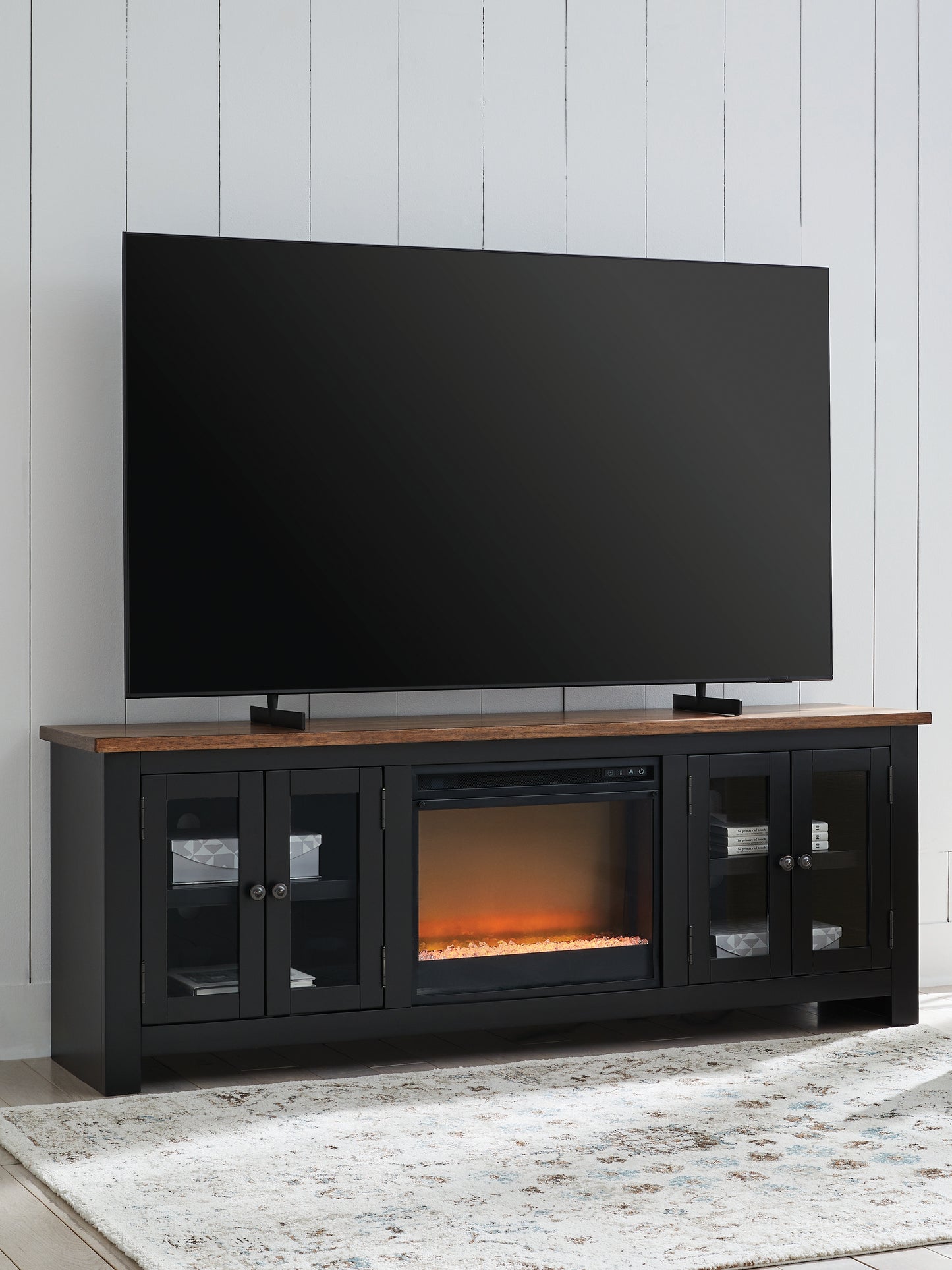 Auburndale Furniture Outlet - Ashley Furniture - Wildenauer 76" TV Stand with Electric Fireplace - 76" TV Stand with Electric Fireplace / Brown/Black - W664W2