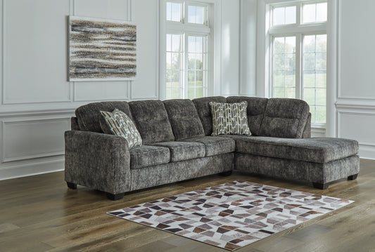 Auburndale Furniture Outlet - Ashley Furniture - Lonoke Sectional - RAF 2-Piece Sectional with Chaise / Gunmetal - 50504S1