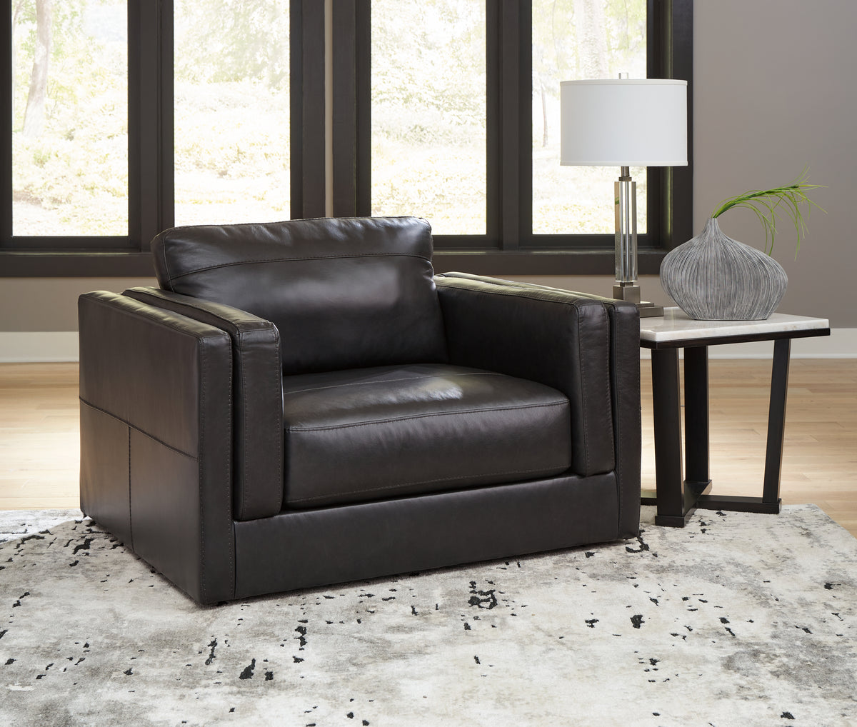 Auburndale Furniture Outlet - Ashley Furniture - Amiata Living Room - Chair and a Half / Onyx - 5740523