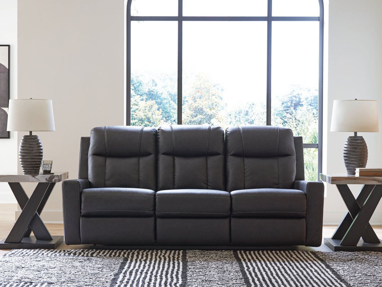 Auburndale Furniture Outlet - Ashley Furniture - Mackmenville Living Room - Reclining Sofa / Carbon - 7471388