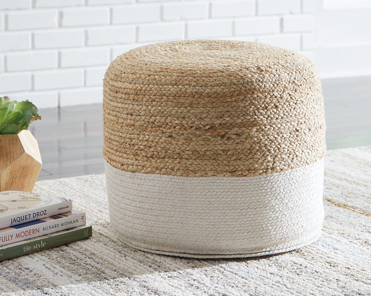 Auburndale Furniture Outlet - Ashley Furniture - Sweed Valley Pouf - Pouf / Natural/Black - A1000422
