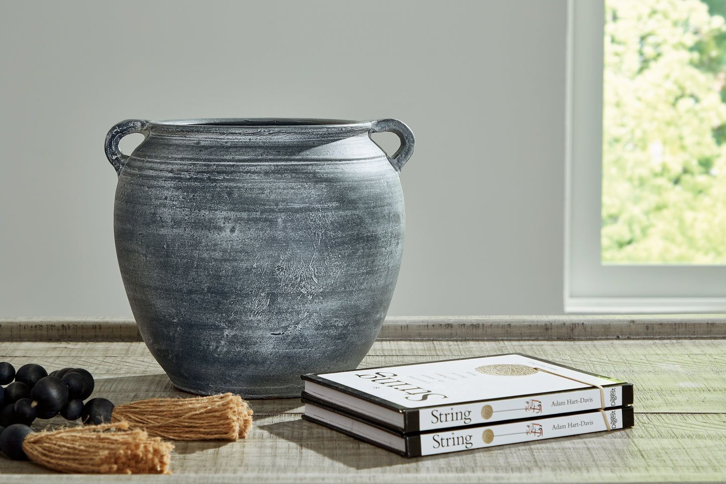 Auburndale Furniture Outlet - Ashley Furniture - Meadie Vase - Vase / Distressed Black - A2000791