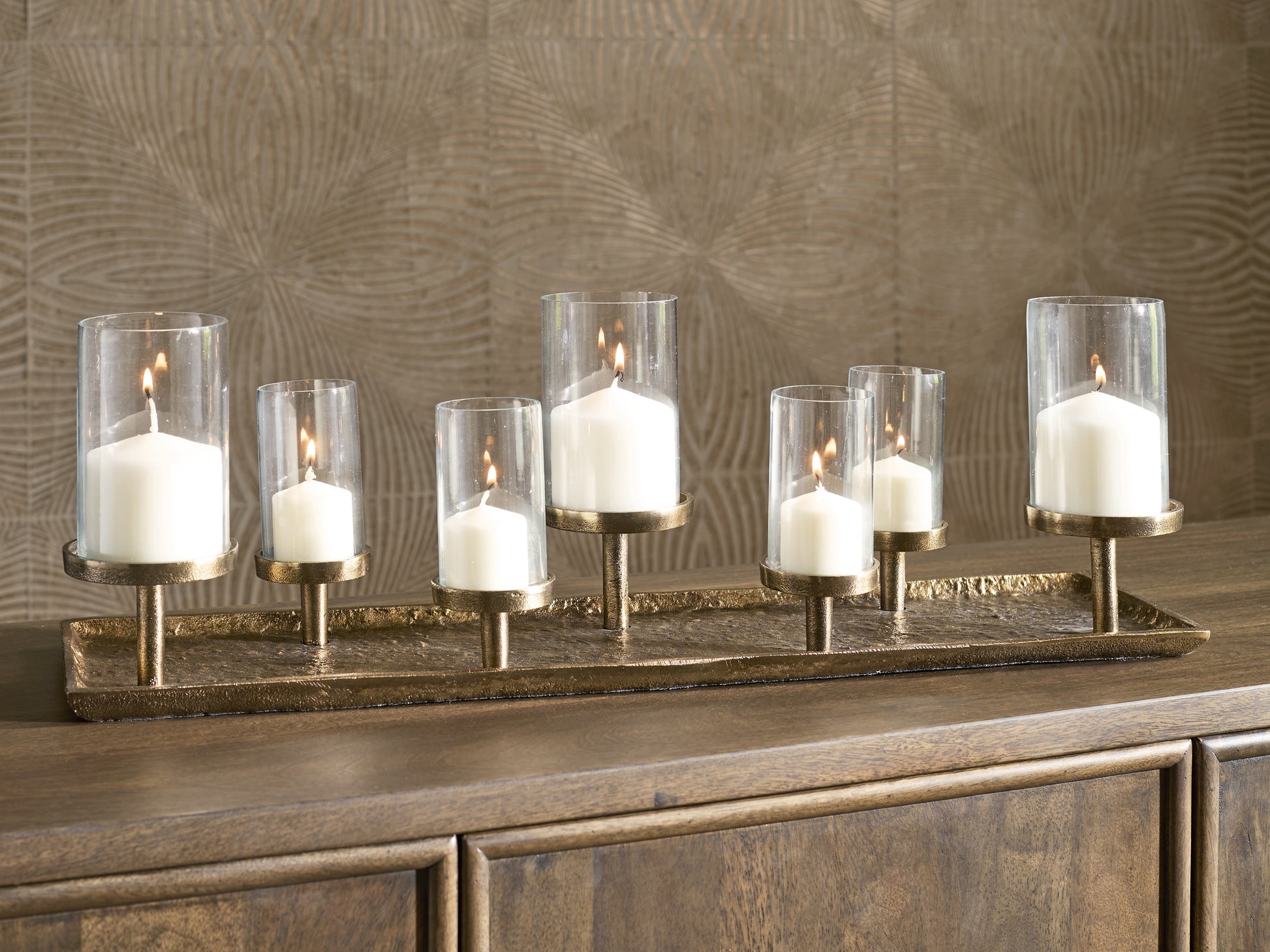 Auburndale Furniture Outlet - Ashley Furniture - Wallmond Candle Holder - Candle Holder / Antique Brass Finish - A2000820