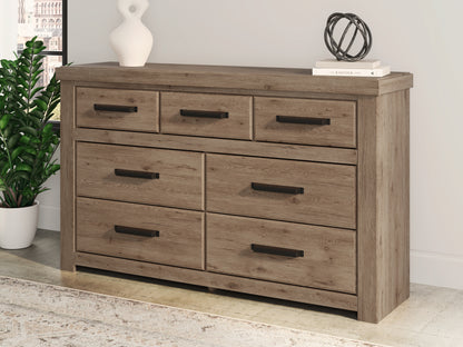 Auburndale Furniture Outlet - Ashley Furniture - Oliandon Bedroom - Seven Drawer Dresser / Light Brown - PCB2844-31