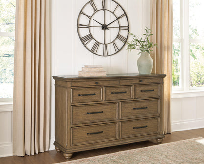 Auburndale Furniture Outlet - Ashley Furniture - Karallin Bedroom - Dresser / Medium Brown - PCB782-31