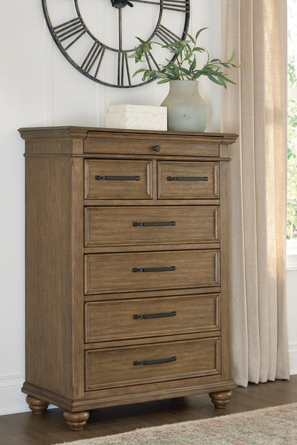 Auburndale Furniture Outlet - Ashley Furniture - Karallin Bedroom - Seven Drawer Chest / Medium Brown - PCB782-46