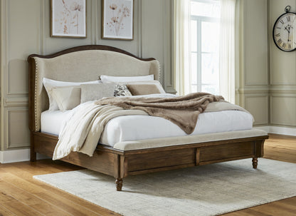 Auburndale Furniture Outlet - Ashley Furniture - Sturlayne Bedroom - King Upholstered Panel Bed / Brown - B787B4
