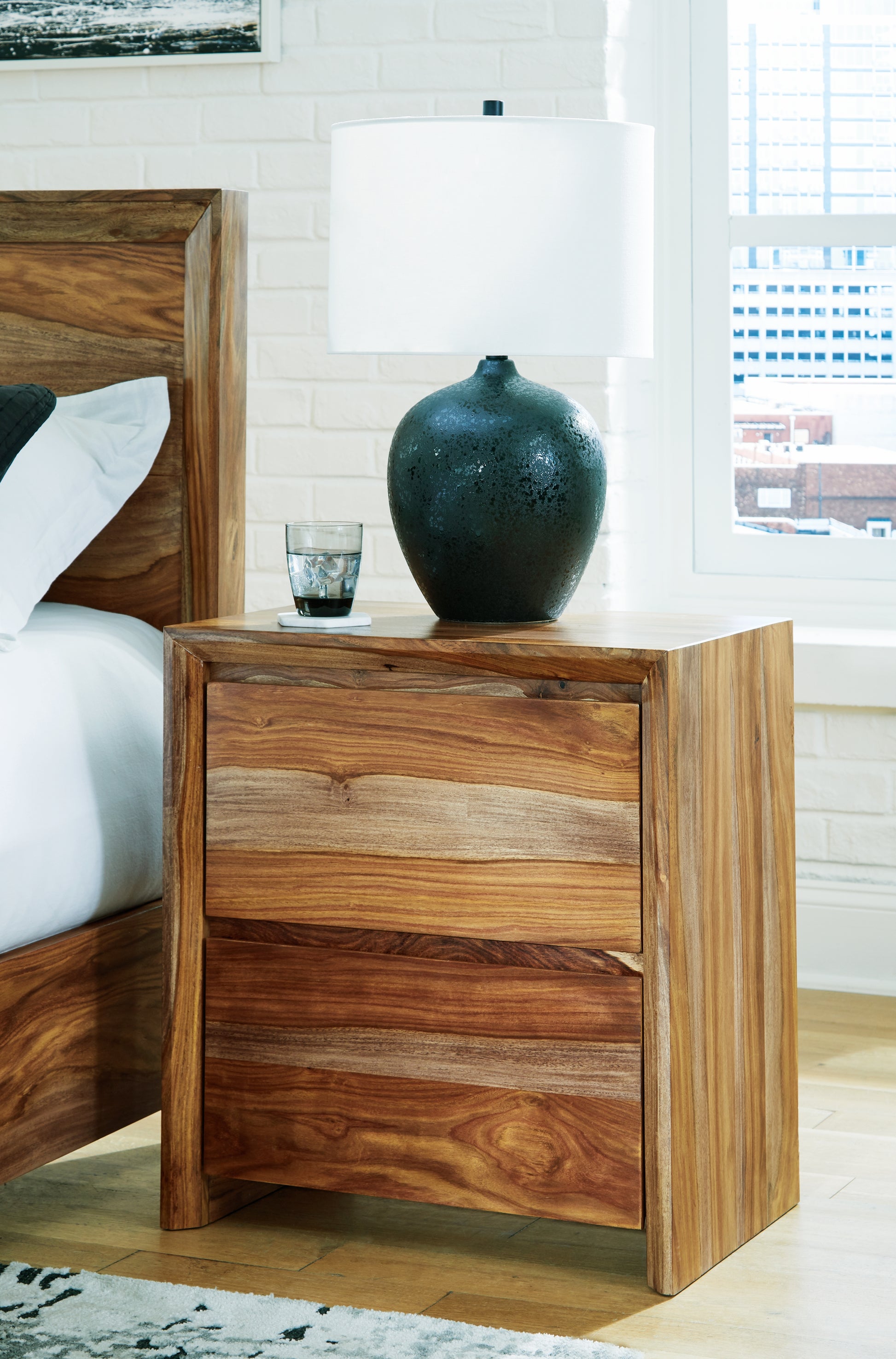 Auburndale Furniture Outlet - Ashley Furniture - Dressonni Bedroom - Two Drawer Night Stand / Brown - B790-92