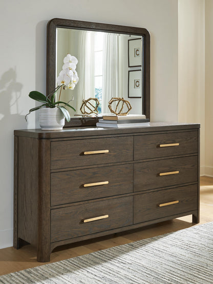 Auburndale Furniture Outlet - Ashley Furniture - Radkin Bedroom - Dresser and Mirror / Burnished Brown - PCB843B1