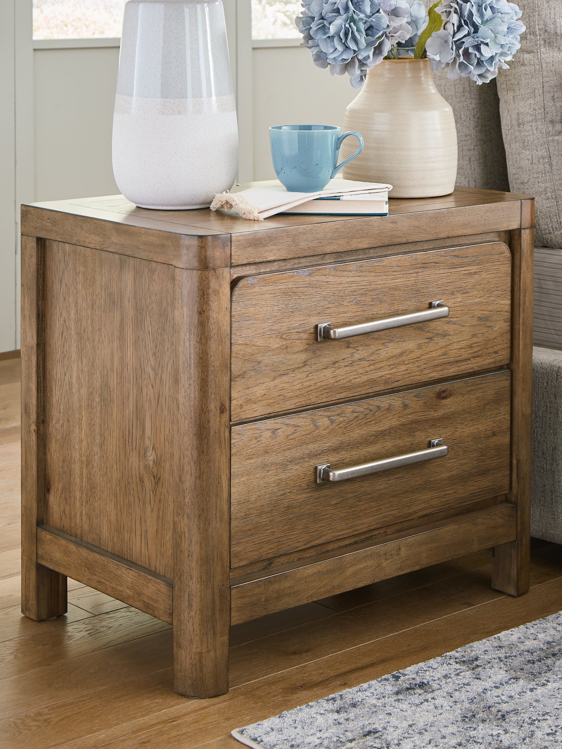 Auburndale Furniture Outlet - Ashley Furniture - Cabalynn Bedroom - California King Panel Bed with Storage / Light Brown - B974B9