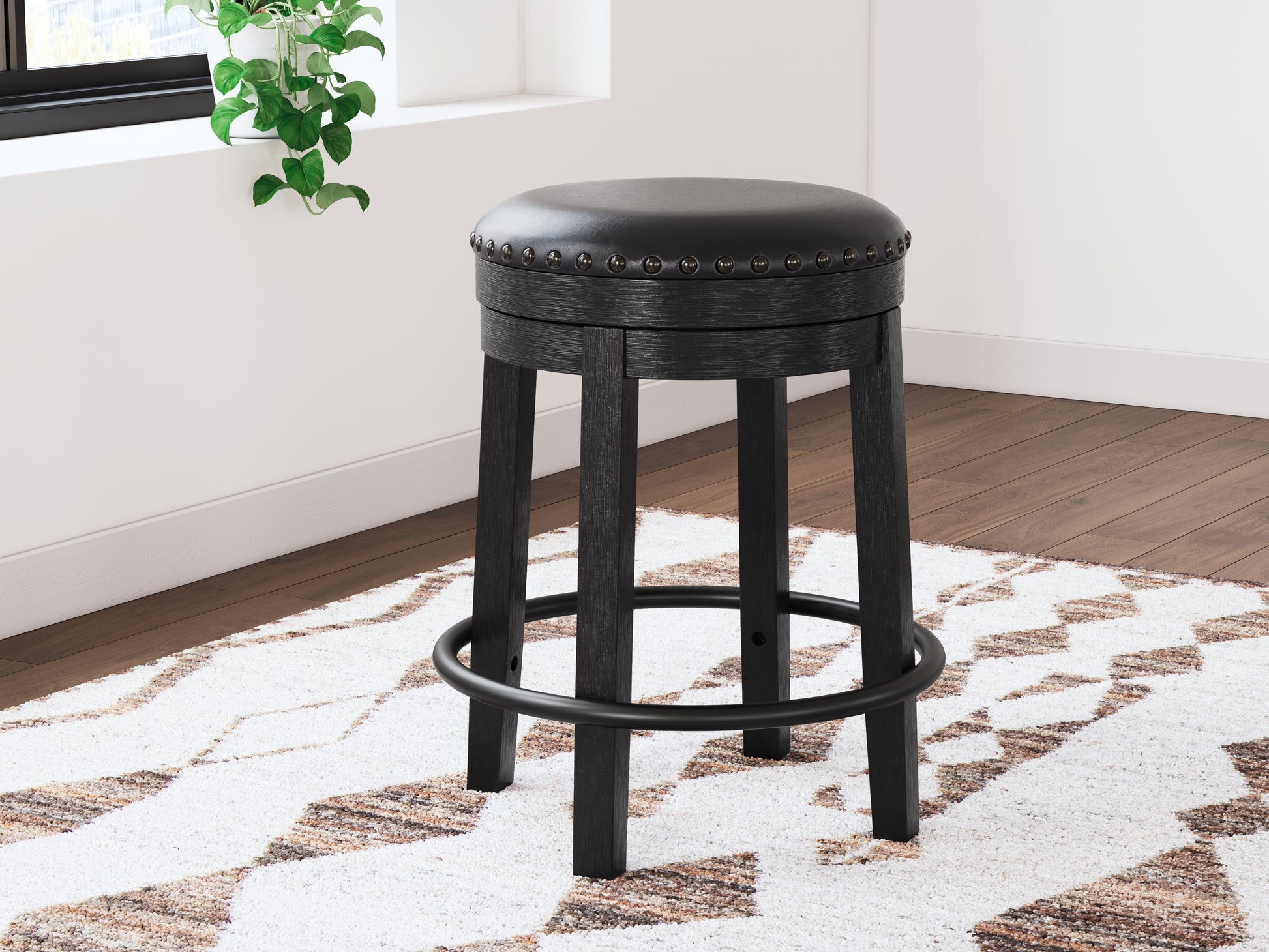 Auburndale Furniture Outlet - Ashley Furniture - Valebeck Dining Room - UPH Swivel Stool (1/CN) / Black - D546-824